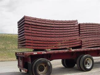 Stacked curved radius forming panels ready for delivery